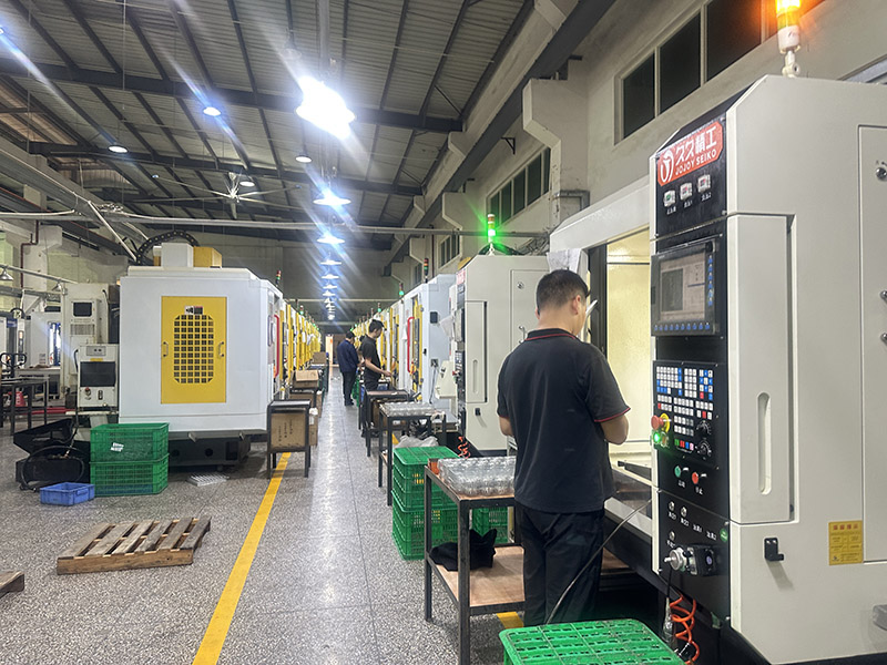 Rejin CNC in-house machining cell producing aluminum audio control panels at volume