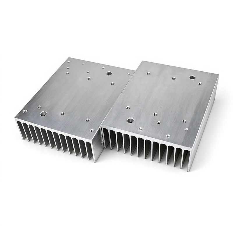 IGBT power module heat sink with multiple tapped mounting holes